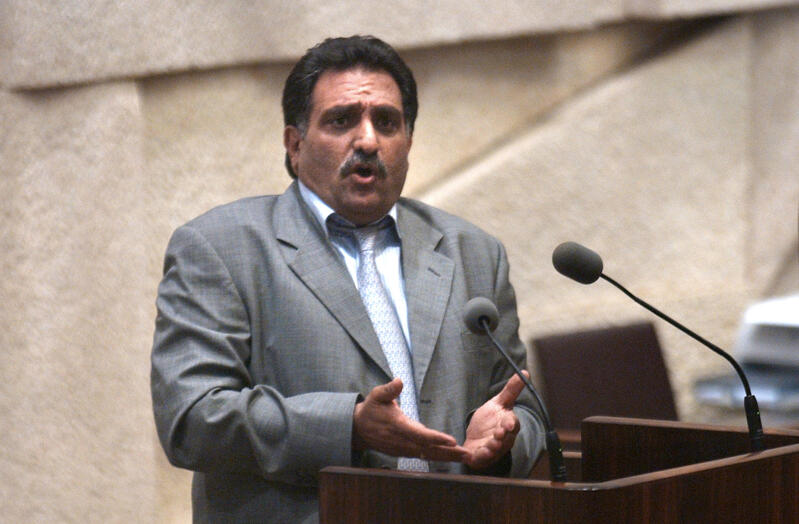 Former Knesset member Azmi Bishara speaks from the Knesset podium in Jerusalem.