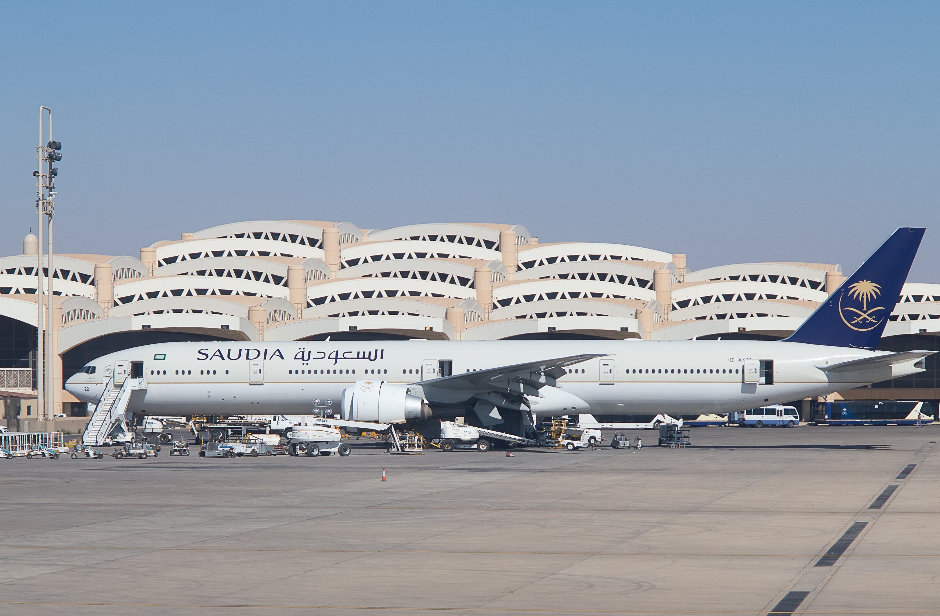 Aircraft preparing for departure at King Khalid International Airport in Riyadh, Saudi Arabia.