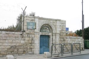 Stone entrance gate of an UNRWA school in East Jerusalem.