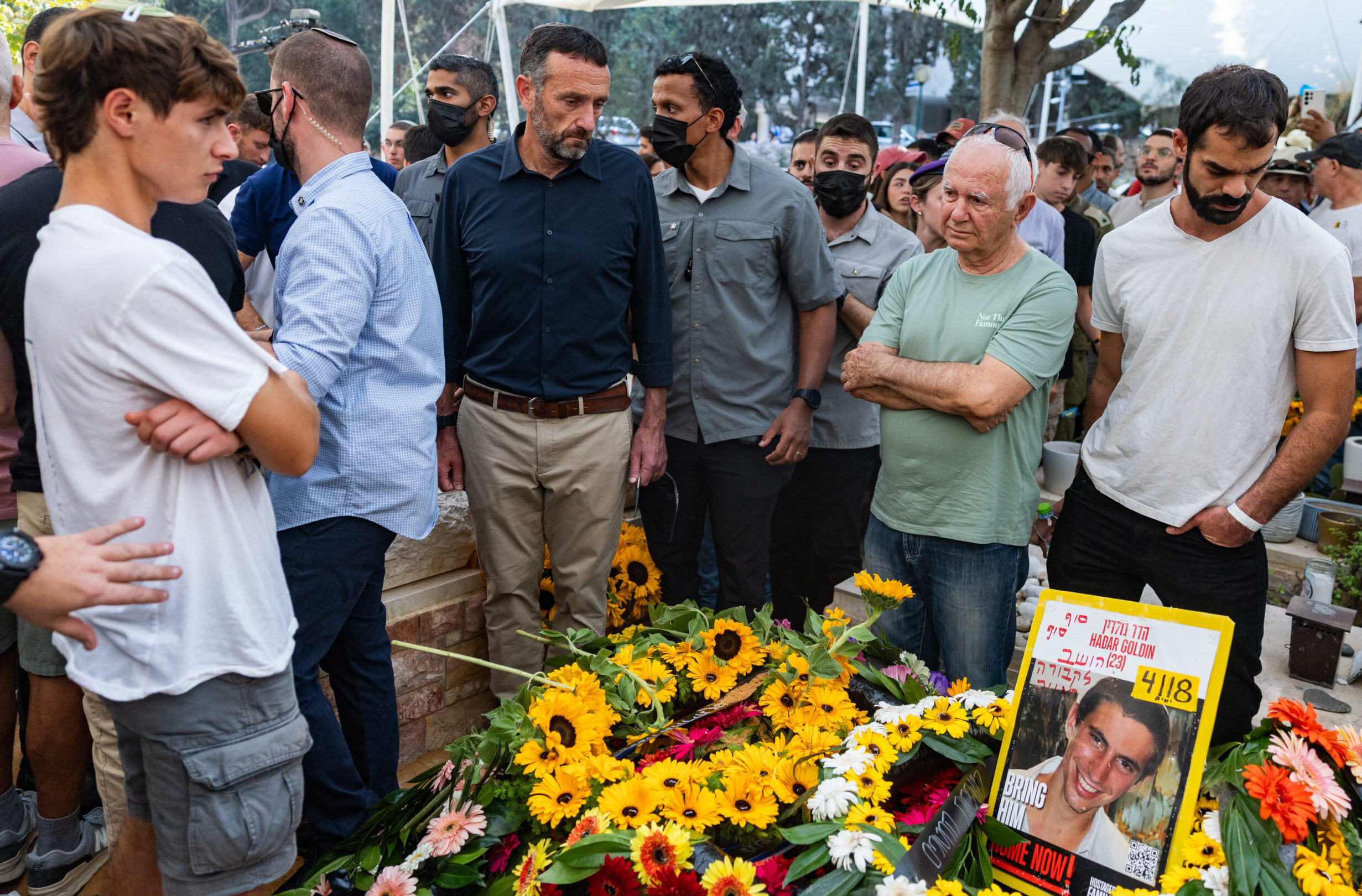 Family and friends gather at the funeral of Israeli soldier Hadar Goldin.