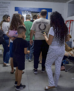 Israelis take cover in a public shelter in Haifa during a missile siren.