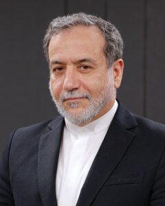 Abbas Araqchi wearing a black suit and white shirt