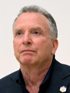 Steve Witkoff wearing a dark jacket.