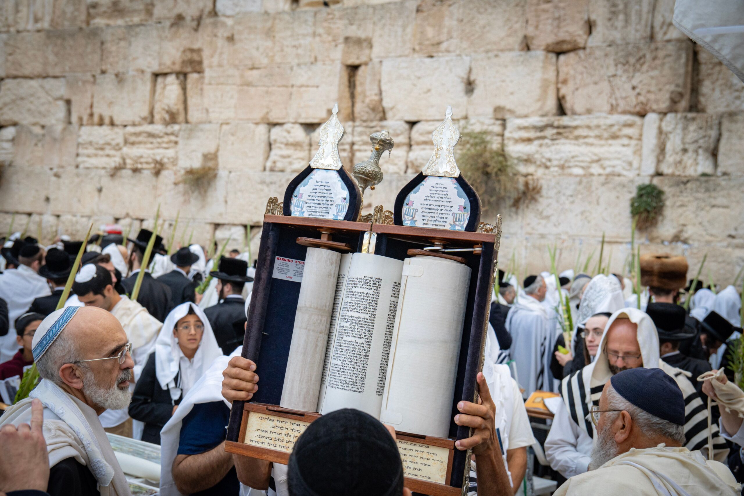 An open Torah scroll during the holiday of Sukkot at the Western Wall 
