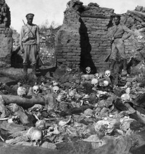 Human remains and skulls at a destroyed site in Sheykhalan during the Armenian genocide period.