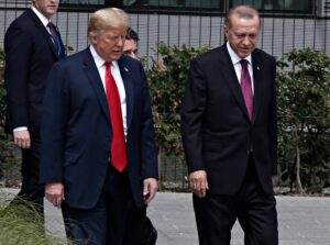 President Donald Trump walking beside Turkish President Recep Tayyip Erdoğan.