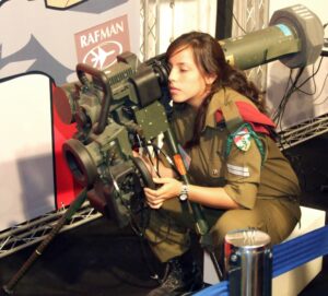 An IDF soldier looking through a Rafael Spike LR launcher display.