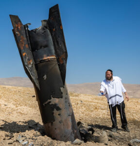 Part of an Iranian ballistic missile seen in the desert near Vered Jericho after being fired toward Israel from Iran.