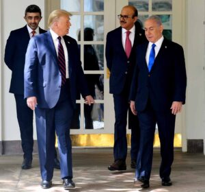 Benjamin Netanyahu, Donald Trump, and Gulf officials attend the Abraham Accords signing ceremony at the White House.