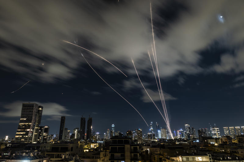 Over Tel Aviv, anti-missile batteries fire interception missiles toward incoming ballistic missiles launched from Iran, during the war with Iran, March 7, 2026