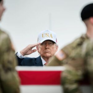 President Donald Trump saluting U.S. service members.