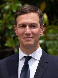 Jared Kushner wearing a dark suit and tie.