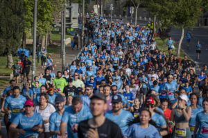 Thousands of runners taking part in the annual Jerusalem Marathon near the Old City walls.