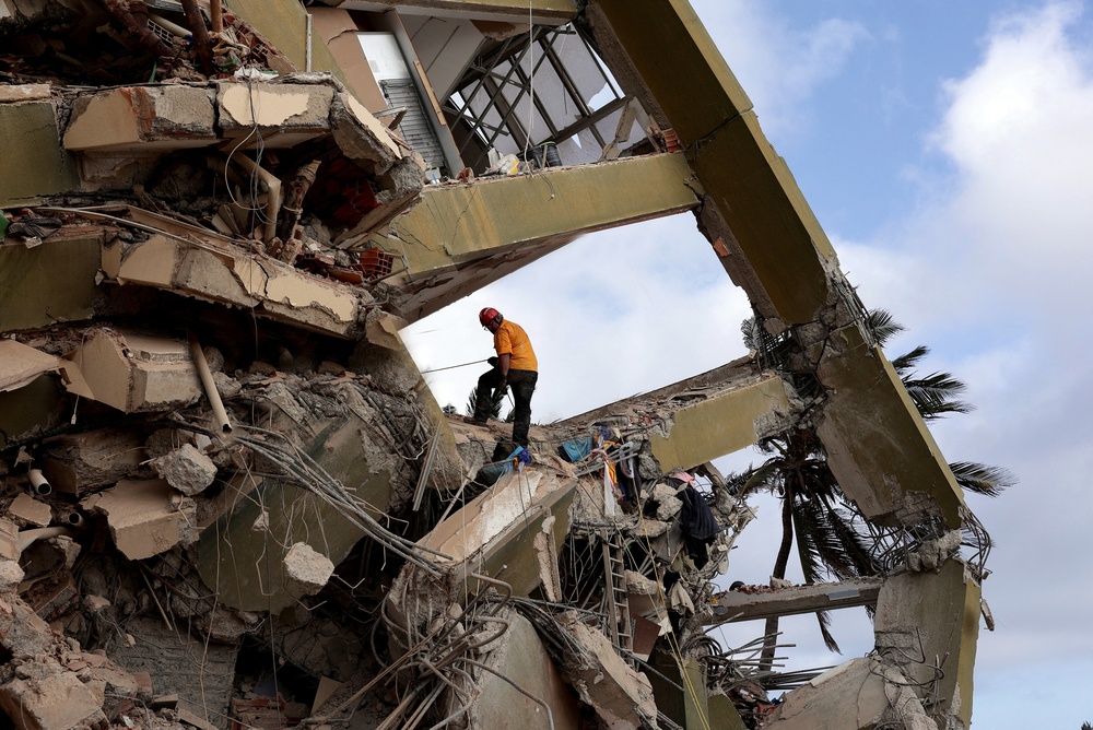 Rescuers help with search and rescue in La Guaira, Venezuela, June 30, 2026