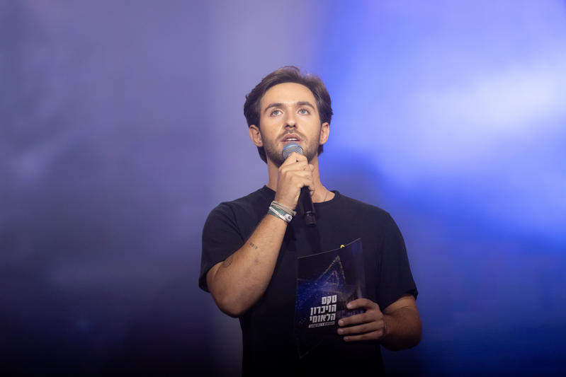 Omer Shem Tov speaking at the Civilian October 7 memorial ceremony at Hayarkon Park in Tel Aviv,