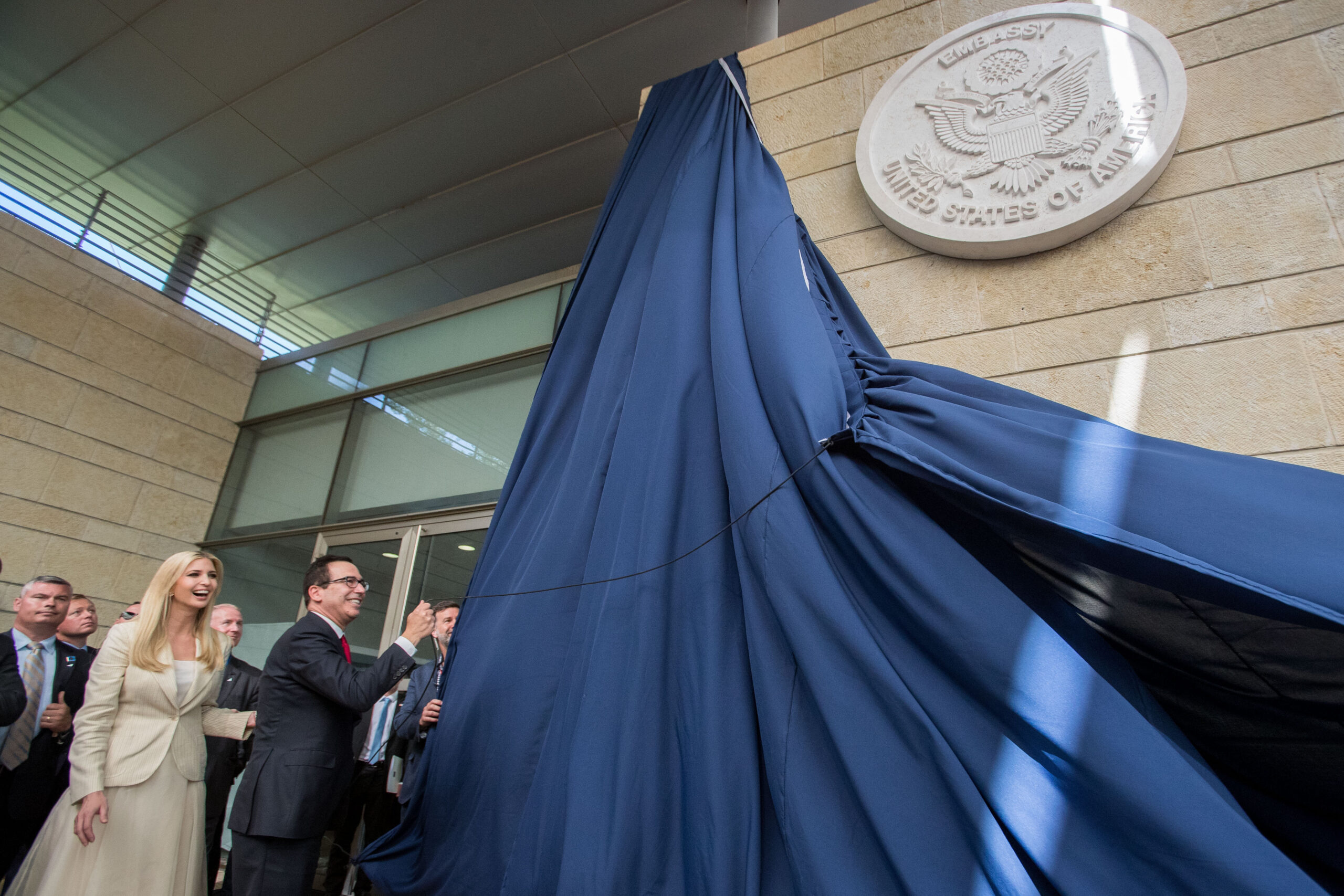 Ivanka Trump and Steven Mnuchin unveil a dedication plaque at the U.S. Embassy opening ceremony in Jerusalem.