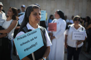 Christian educators and religious figures protesting for equality for Christian schools in Jerusalem in 2015.