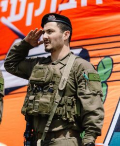 Dor Ben Simchon saluting while wearing an IDF uniform
