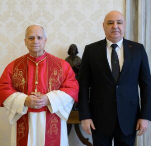 Pope Leo XIV standing beside Lebanese President Joseph Aoun at the Vatican.