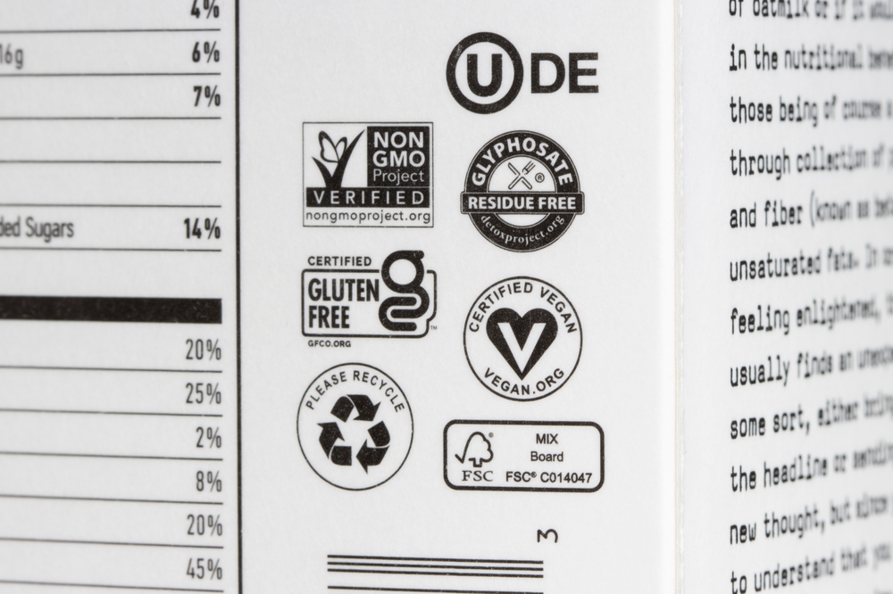 Side view of graphics on food carton with Kosher certification symbol OU