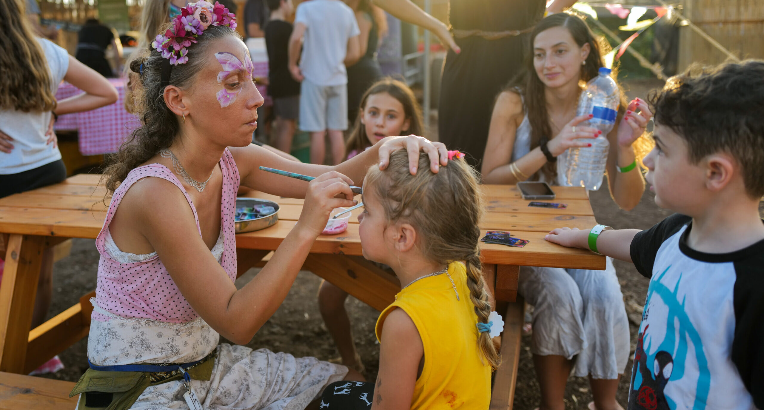 Young Israeli families enjoy an outdoor festival in the Golan Heights.