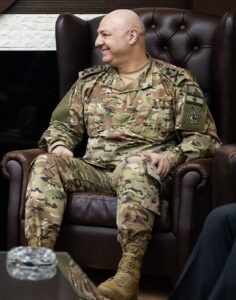 Joseph Aoun seated in a chair wearing a Lebanese military uniform