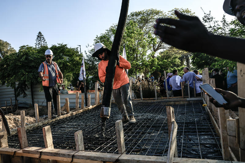 A ceremony marking rebuilding in Kibbutz Nir Oz, after October 7th massacre. First foundations being laid for new homes in August, 2025