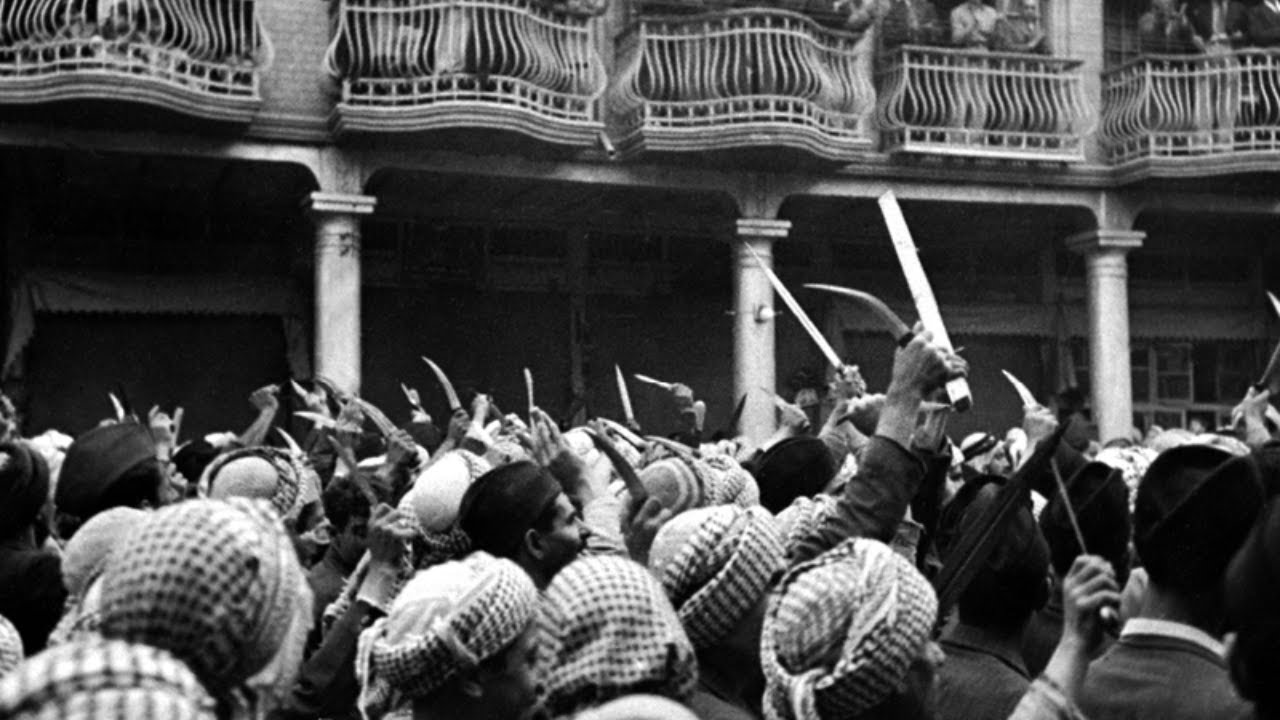 A black-and-white image showing the 1941 Farhud pogrom against the Jews of Iraq.