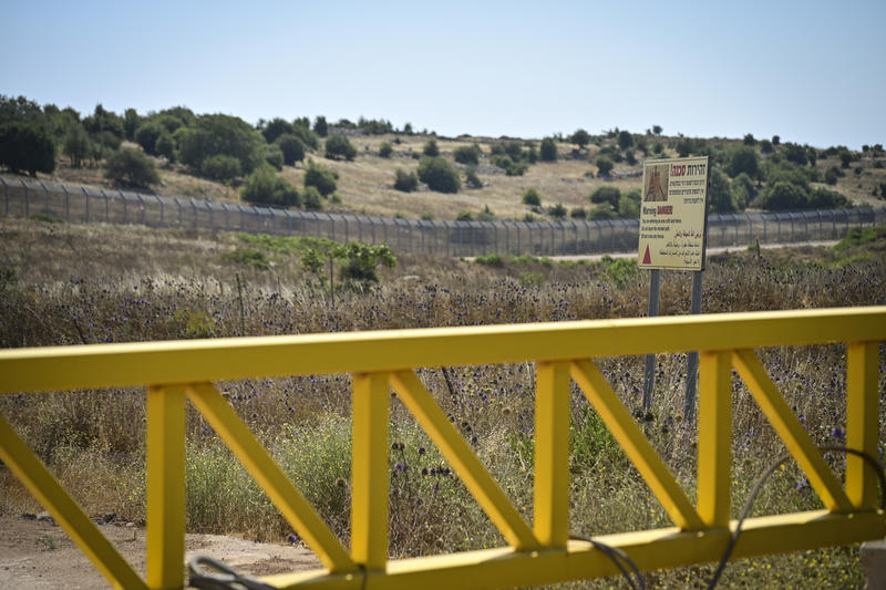 yellow gate at israeli border with Syria in Golan Heights