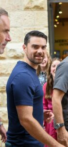 Ben Shapiro and Jordan Peterson touring Jerusalem with a group of people.
