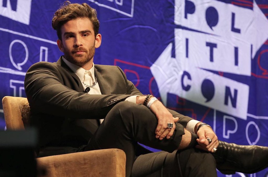 hasan piker seated on a talkshow
