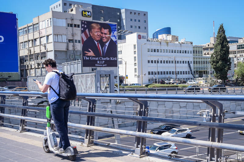 Banner of Trump and Charlie Kirk embracing, Ayalon Highway, Tel Aviv