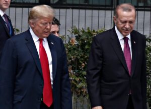 President Donald Trump walking beside Turkish President Recep Tayyip Erdoğan.