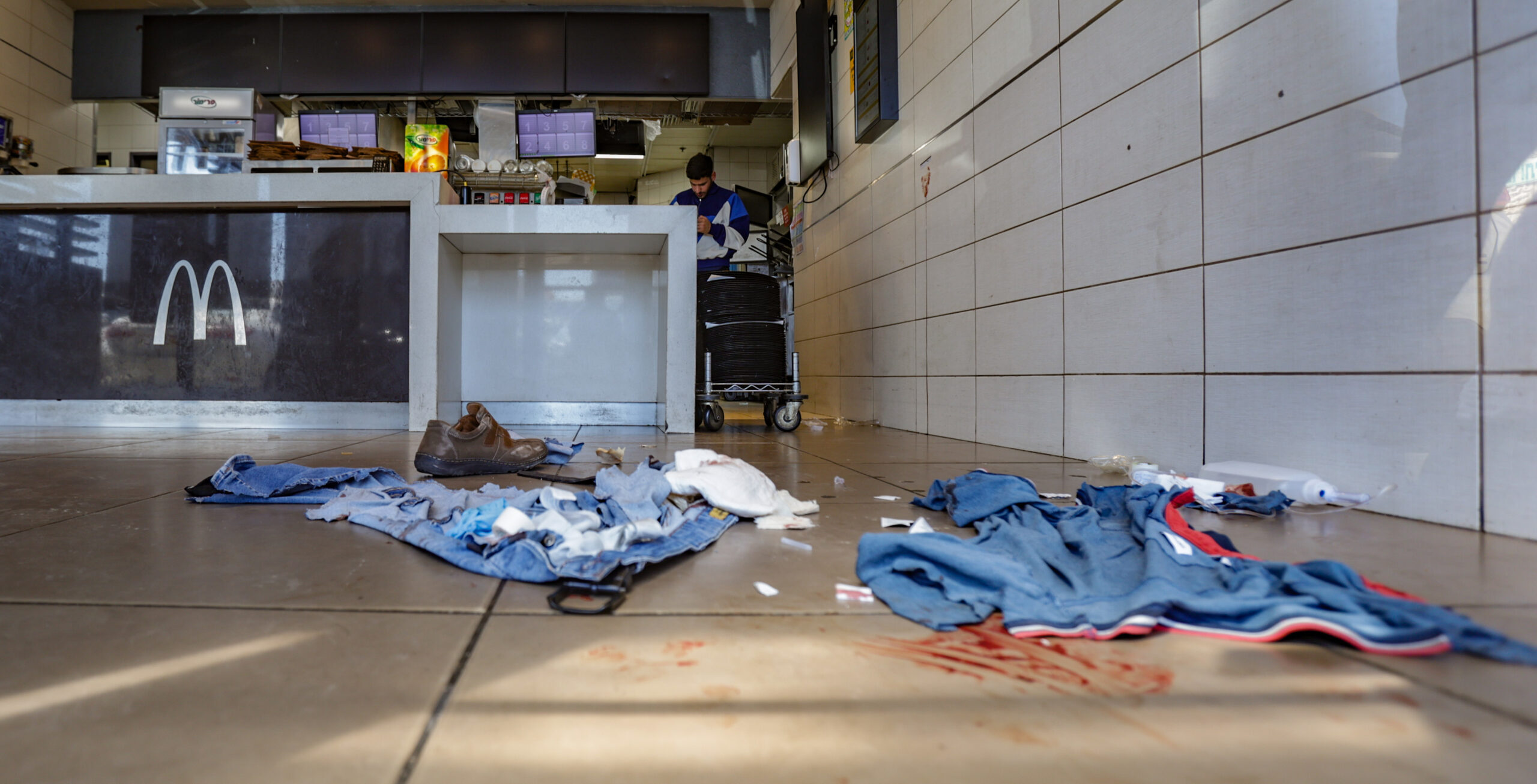The scene where terrorists opened fire at civilians inside a gas station near Kochav Yair.